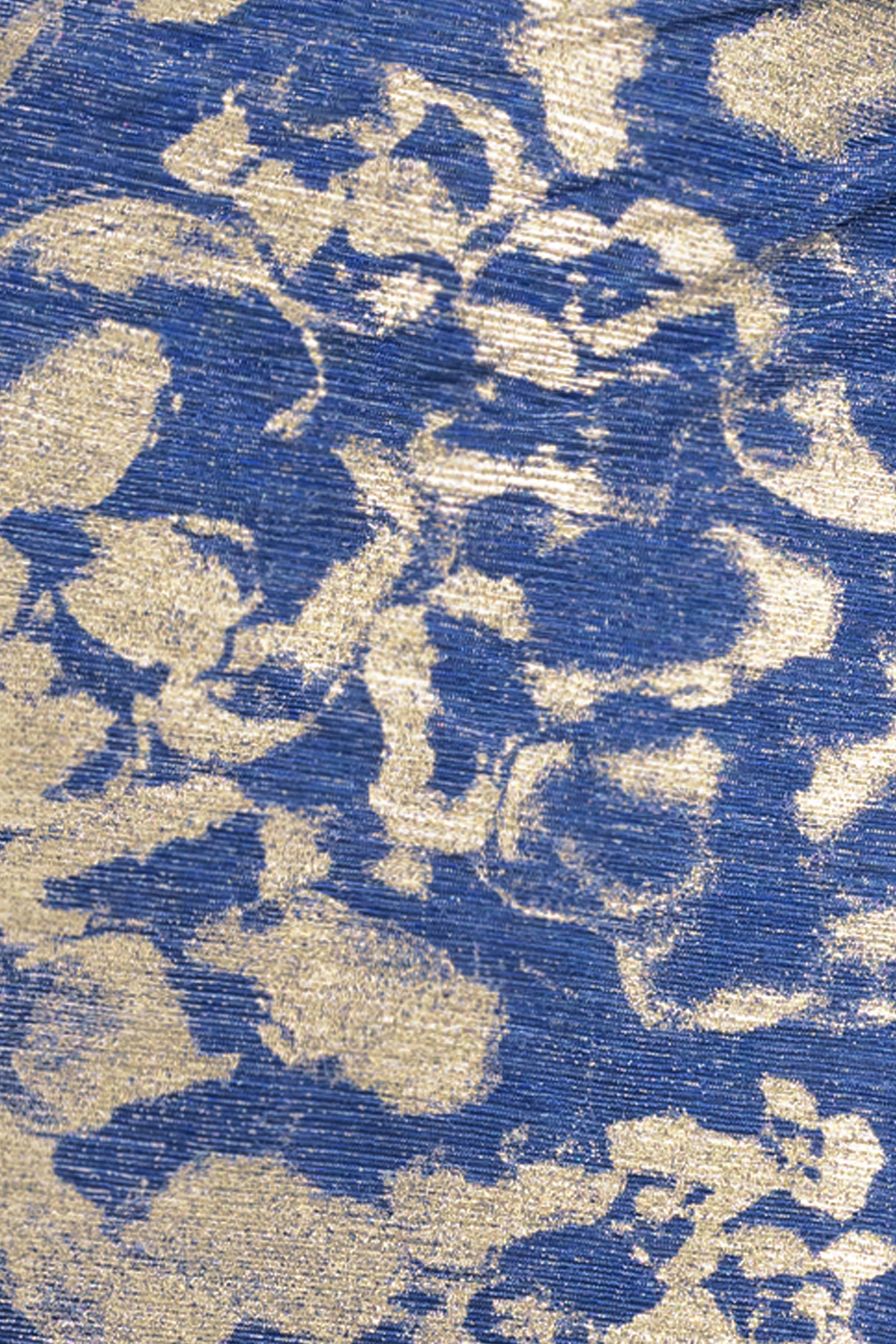 Close-up of the slate and gold floral metallic foil mesh on the Petite Cory Metallic Print Ruched Dress