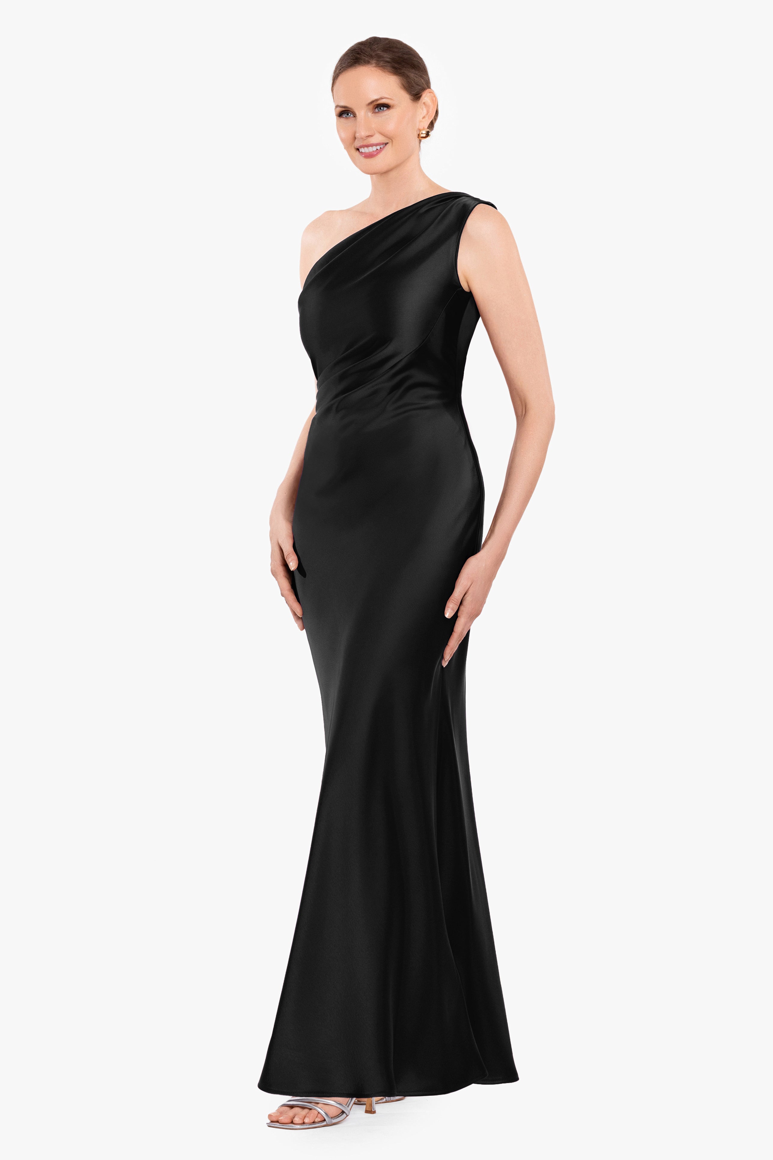 Magnolia satin one shoulder dress in black, three-quarter view.
