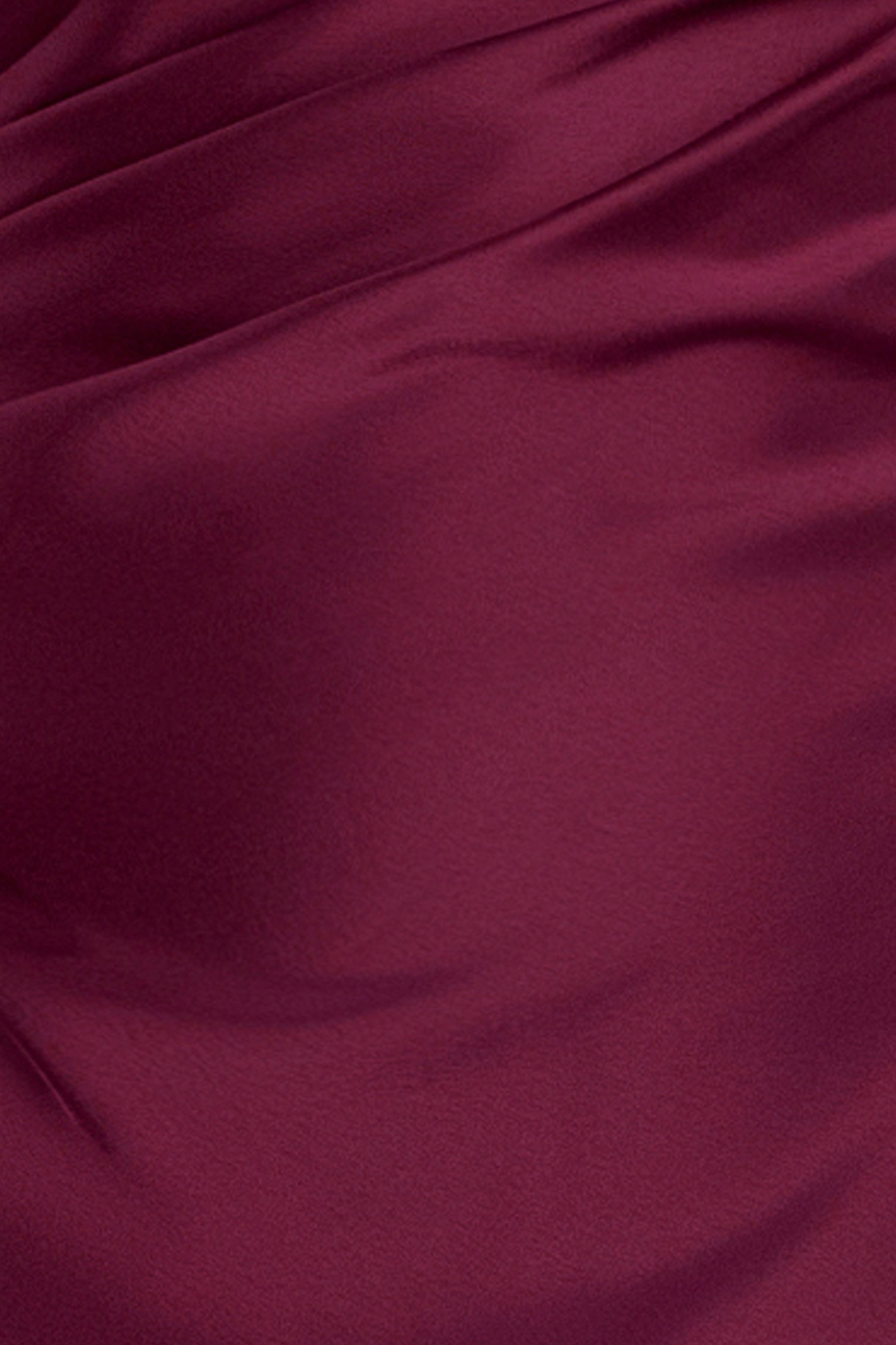 Close-up of the double-face satin fabric on the Magnolia satin one shoulder dress, in wine