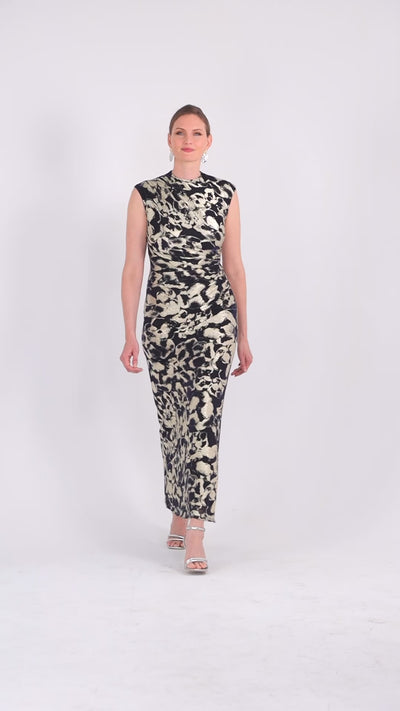 Petite Cory metallic print ruched dress, showing skirt movement in navy/gold.